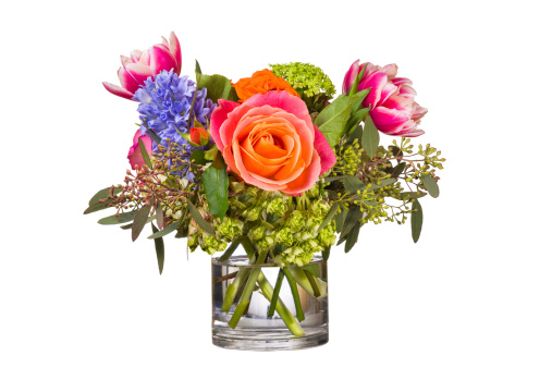 Multicolored arrangement of flowers isolated on a white background