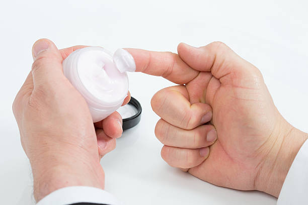 istock Cosmetic cream and finger 474161535