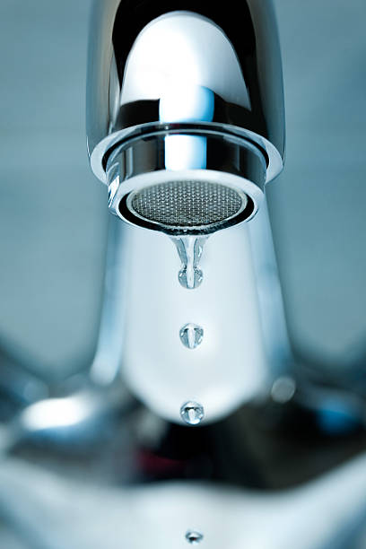 istock leaking bathroom water tap close up 474163301