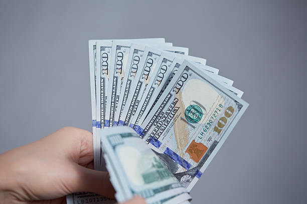 istock Money in female hands 474163516
