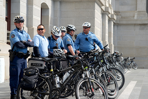 Philadelphia, PA, USA - April 30, 2015; Officers with the Bike Patrol Unit of the Philadelphia Police Department stand behind parked bikes near Philadelphia City Hall, ahead of the April 30 rally in support of the national 'Black Lives Matter' movement (photo by Bastiaan Slabbers)