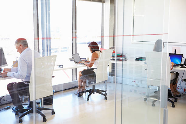 istock Group of people working in a modern office 474168438
