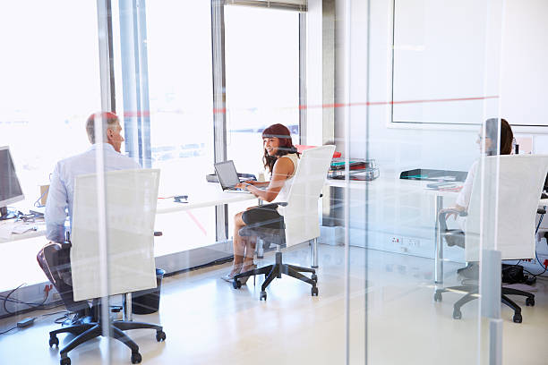istock Group of people working in a modern office 474168442