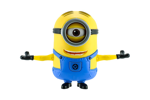 Bangkok,Thailand - May 17, 2015: Minions stretch the arms isolated on white background an action figure from Despicable Me 2 animated 3D film produced by Illumination Entertainment for Universal Pictures.