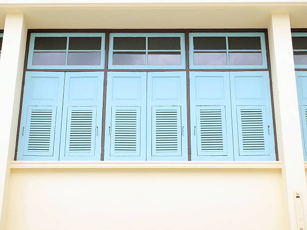 istock thai old style classic window in yellow and green color 474172406