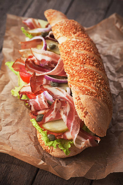 Submarine sandwich with bacon stock photo