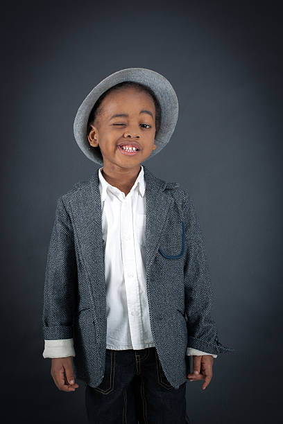 istock Handsome boy doing different expressions in different sets of clothes 474174346