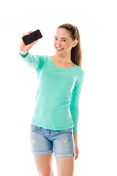 istock model isolated on white holding phone 474174484