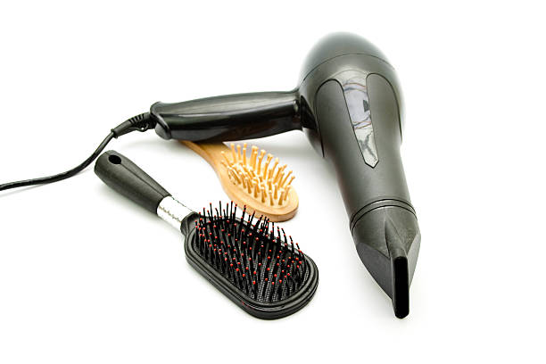 istock Black Hairdryer with Different Hairbrush 474178311