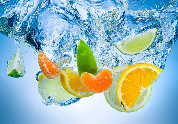 istock Tropical fruits fall deeply under water with a big splash 474178359
