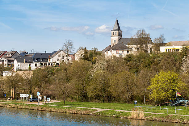 River Mousel in sunny spring, Luxembourg River Mousel in sunny spring, Luxembourg remich stock pictures, royalty-free photos & images