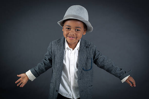 istock Handsome boy doing different expressions in different sets of clothes 474178762