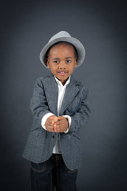 istock Handsome boy doing different expressions in different sets of clothes 474178936