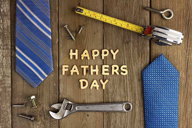 istock Happy Fathers Day on wood with tools and ties 474179564
