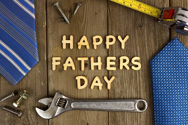 istock Happy Fathers Day on wood with tools and ties 474179566