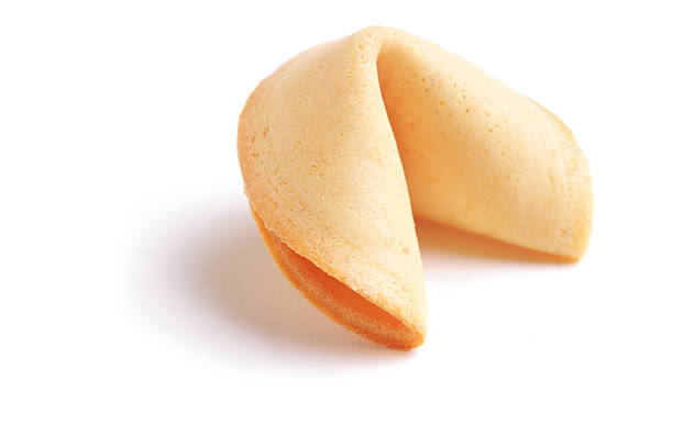 istock Studio shot of a fortune cookie isolated on white background 474179797