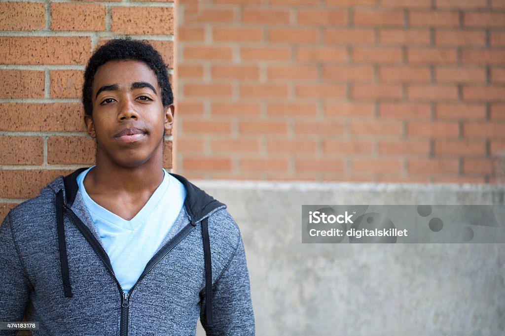African American teenager looking to the future. Profile of an African American Teenager with copy space. Teenager Stock Photo