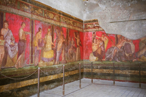 Wall painting at the room of the frescoes in Villa dei Misteri, Pompeii, Italy