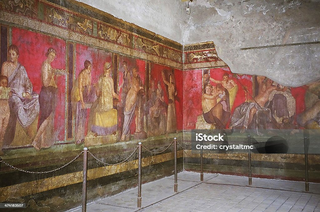 Wall painting in Pompeii, Italy Wall painting at the room of the frescoes in Villa dei Misteri, Pompeii, Italy Pompeii Stock Photo