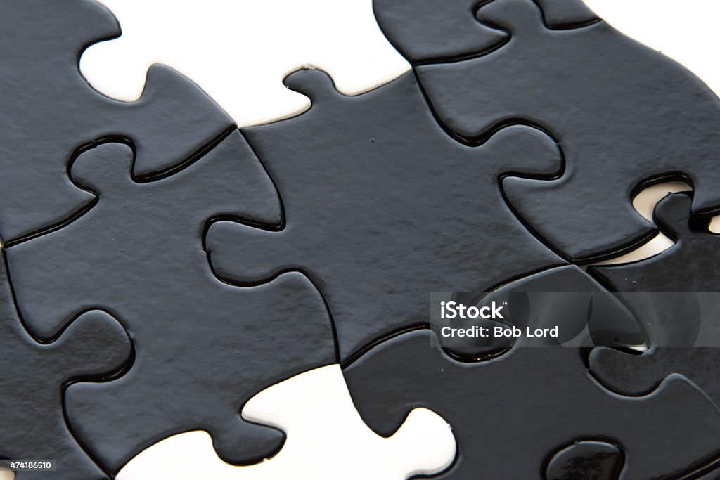 black and white puzzle pieces black and white puzzle pieces contrasting 2015 Stock Photo