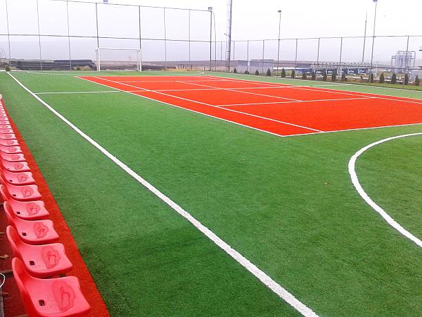 artificial turf campo de fútbol americano - football field artificial turf end zone turf fotografías e imágenes de stock