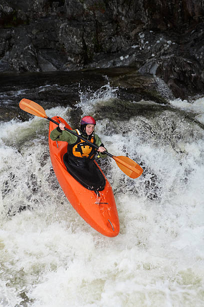 istock Woman kayaking in river 474189979