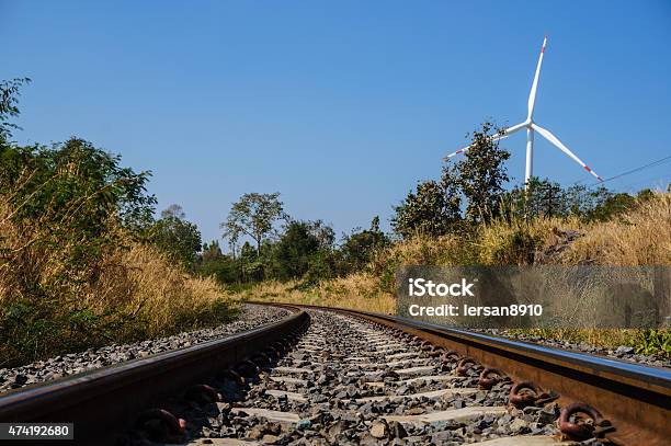 Railroad And Wind Turbine Stock Photo - Download Image Now - 2015, Blue, Choice