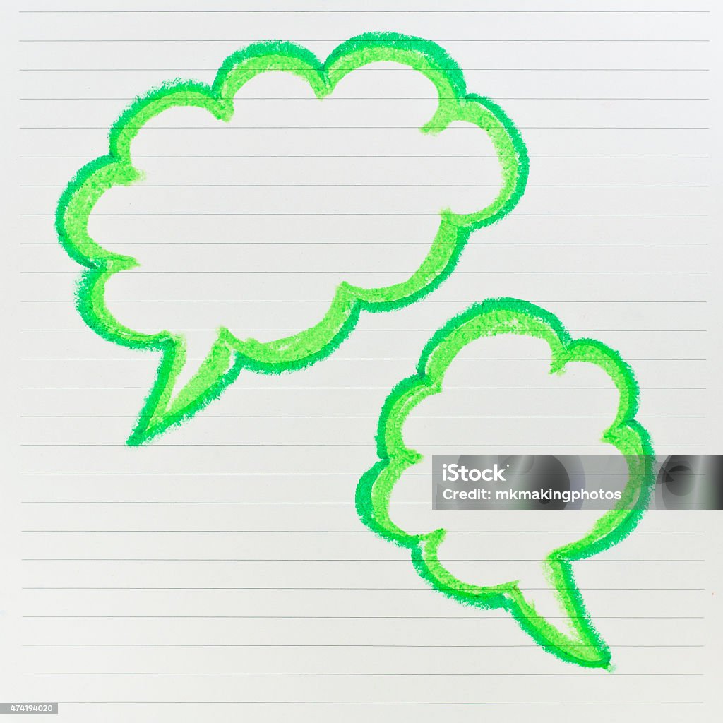 Sketch of green speech bubble on the lined paper 2015 Stock Photo