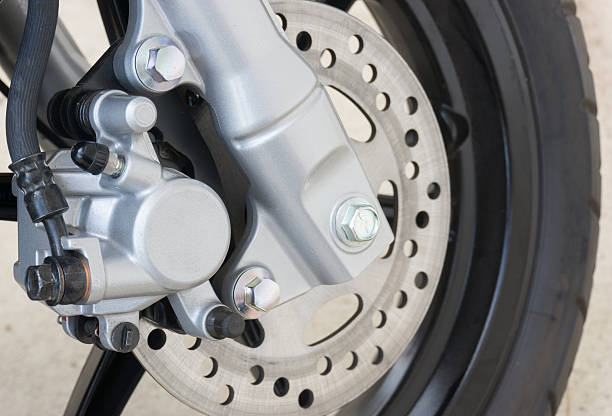 istock closeup on caliper brake of motorcycle 474194148