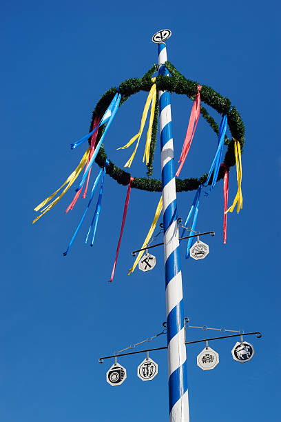 bavarian maypole agaist blue sky maypole, ribbon, German Cultures, 1st of may, beer garden, Bavaria whitsun stock pictures, royalty-free photos & images