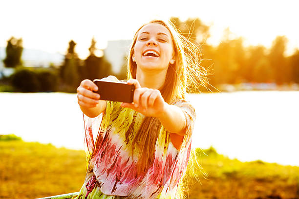 istock girl with a smartphone 474199337