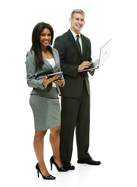istock Happy business couple using laptop and tablet 474199552