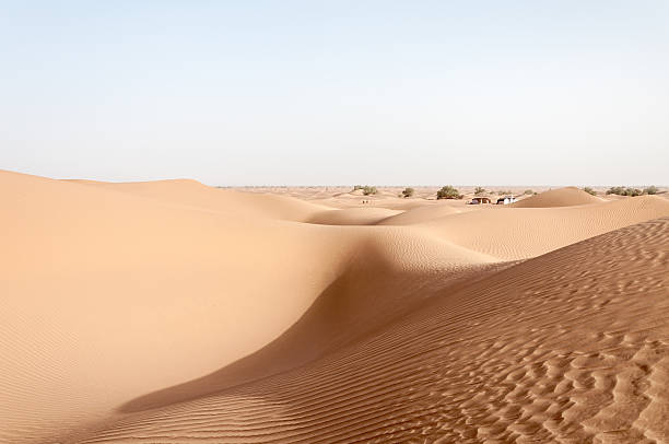 Tents among sand dunes, Draa valley (Morocco) stock photo