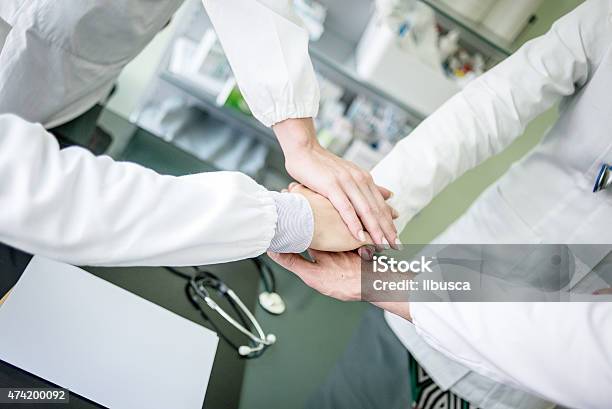 Group Of Doctors At The Medical Office Teamwork Concept Stock Photo - Download Image Now