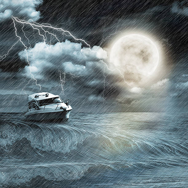 istock Boat in storm  evening on ocean and the moon 474200563