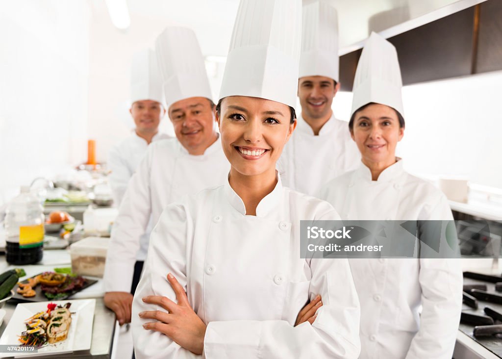 Group of chefs Group of chefs in a cooking class looking happy Chef Stock Photo