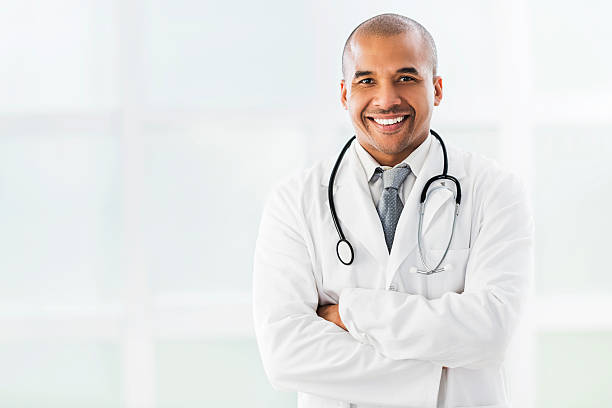 istock Smiling confident African American doctor looking at camera. 474203284