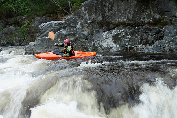 istock Woman kayaking in river 474211869