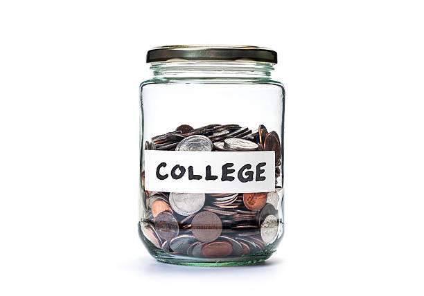College savings coin jar stock photo