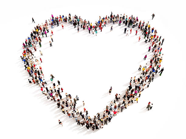 Large group of people in the shape of a heart. stock photo