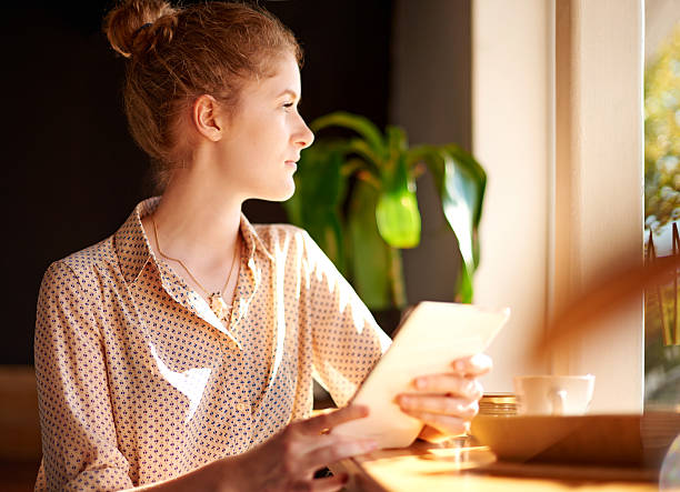 istock Her own quiet corner at the cafe 474212508