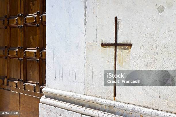 Iron Cross Snuggled In White Stone Stock Photo - Download Image Now - 2015, Catholicism, Christianity