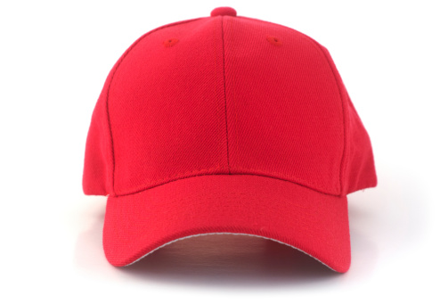 Isolated red baseball cap on a white background.