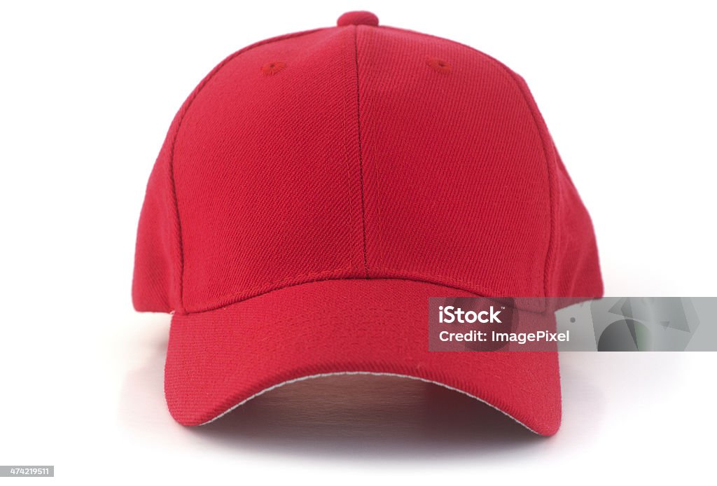 Red Baseball Cap Isolated red baseball cap on a white background. Red Stock Photo