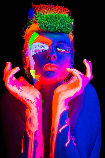 istock Women Portrait in Ultraviolet Light 474219551