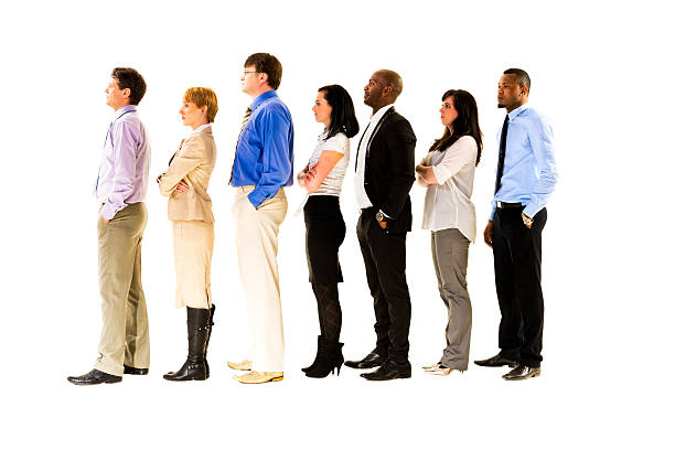 istock Business people standing in a line against white background 474222603