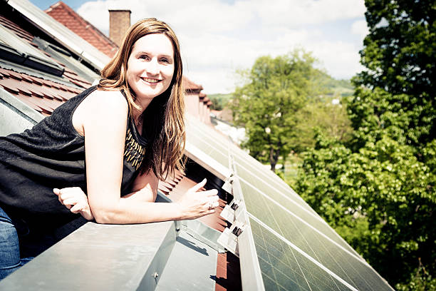 istock home owner is happy with solar panels on his roof 474223472