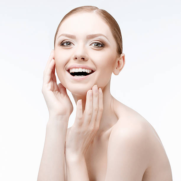 istock Beautiful Woman with Clean Fresh Skin 474224302