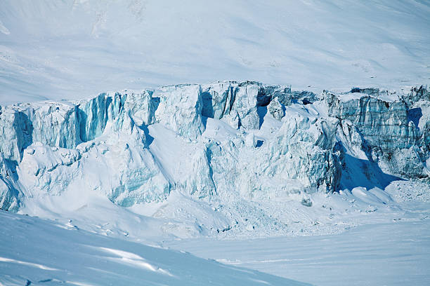 istock collapsing glacier and frozen lake 474227606