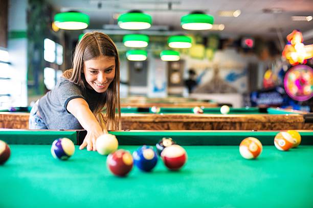 istock Woman Playing Billiard 474230798